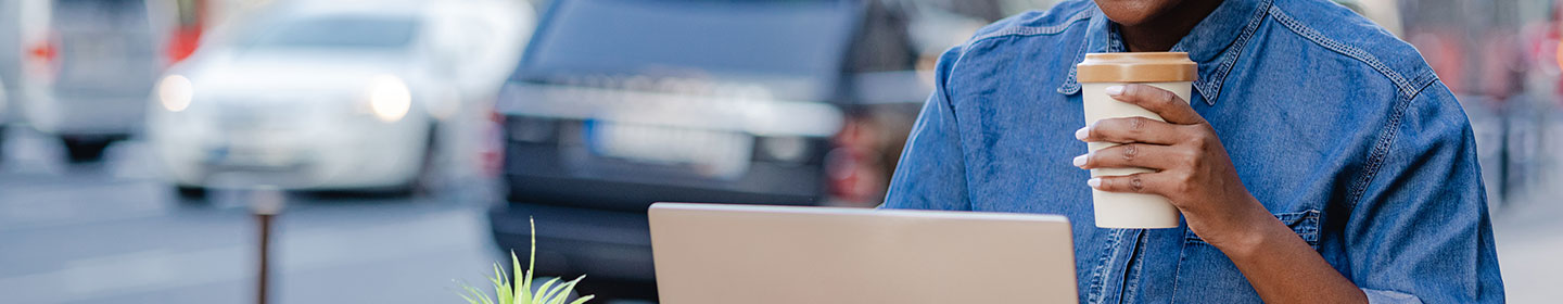 person using tablet in shipping yard